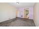 Large, carpeted bedroom provides a tranquil retreat with adjoining bathroom for added convenience at 11565 Decatur St # 7D, Denver, CO 80234