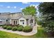 Charming townhome with well-maintained landscaping and inviting curb appeal on a beautiful, sunny day at 11565 Decatur St # 7D, Denver, CO 80234