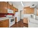 Bright kitchen with hardwood floors and lots of cabinet space at 11565 Decatur St # 7D, Denver, CO 80234