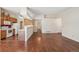Open-concept living space showcasing hardwood floors and a comfortable living area at 11565 Decatur St # 7D, Denver, CO 80234