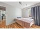 Unfurnished bedroom with window and closet at 15627 E 51St Dr, Denver, CO 80239