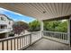 Outdoor balcony overlooking mature trees at 4947 Noble Park Pl, Boulder, CO 80301