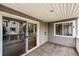 Balcony with sliding glass door and window at 4947 Noble Park Pl, Boulder, CO 80301