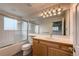 Bathroom with glass enclosed shower, a vanity with a large mirror, and tile flooring at 4947 Noble Park Pl, Boulder, CO 80301