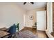 Office with hardwood floors, area rug, chair, desk, bench and natural light at 2222 N Williams St, Denver, CO 80205