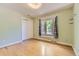 Light-filled bedroom with light wood floors and closet at 540 Ithaca Dr, Boulder, CO 80305