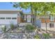 Close up of attractive single-story home featuring a brick facade and xeriscaped front yard at 540 Ithaca Dr, Boulder, CO 80305