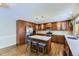 Modern kitchen featuring stainless steel appliances, an island with seating, and plenty of cabinet space at 540 Ithaca Dr, Boulder, CO 80305