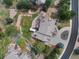 Beautiful aerial view of a private estate with lush landscaping, outdoor kitchen, and stunning backyard at 4 White Fir Ct, Littleton, CO 80127