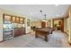 Entertaining basement featuring a pool table, wet bar, and office space at 4 White Fir Ct, Littleton, CO 80127