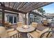 Relax and enjoy this beautiful outdoor living space with a fire pit and comfortable seating at 4 White Fir Ct, Littleton, CO 80127