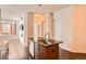Bright kitchen with a granite island, stainless steel dishwasher, and open floorplan at 336 E 1St Ave # 200, Denver, CO 80203