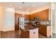Kitchen featuring stainless steel appliances, mosaic backsplash, and a large island at 336 E 1St Ave # 200, Denver, CO 80203