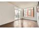Spacious room with hardwood floors, large windows offering natural light, and minimalist design at 336 E 1St Ave # 200, Denver, CO 80203