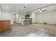 Finished basement with a bar area, ample space, and neutral carpet at 8427 Pierson Ct, Arvada, CO 80005