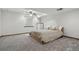 A lovely bedroom with a neutral color palette, plush carpet, and a ceiling fan for added comfort at 8427 Pierson Ct, Arvada, CO 80005