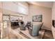 Spacious living room open to the kitchen offers great views and comfortable seating with a fireplace at 2061 S Worchester Way, Aurora, CO 80014