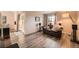 Spacious living room with stylish hardwood floors and access to a outdoor patio at 2061 S Worchester Way, Aurora, CO 80014