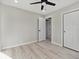 Comfortable bedroom with hardwood floors, a closet, and ample natural light at 1475 S Eaton St, Lakewood, CO 80232