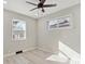 Serene bedroom featuring hardwood floors, two windows, and neutral wall color at 1475 S Eaton St, Lakewood, CO 80232