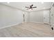 Bright living room with wood flooring and a ceiling fan at 1475 S Eaton St, Lakewood, CO 80232