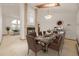 Elegant dining room with a fireplace and furniture, perfect for hosting gatherings at 5448 S Swadley Ct, Littleton, CO 80127