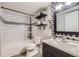 Updated bathroom featuring new fixtures, subway tile, and a modern vanity at 8450 Decatur St # 97, Westminster, CO 80031