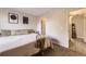 Comfortable bedroom featuring soft carpet, neutral wall color, and warm decor at 8450 Decatur St # 97, Westminster, CO 80031