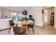 A view of the dining and living room area showing modern furnishings and open living space at 8450 Decatur St # 97, Westminster, CO 80031