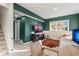Finished basement with a comfortable sitting area and home office at 2801 W 23Rd Ave, Denver, CO 80211