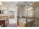 Inviting bathroom with a soaking tub, separate shower, and a double vanity, great natural light at 2801 W 23Rd Ave, Denver, CO 80211
