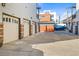 Attached garage with additional parking spaces at 2801 W 23Rd Ave, Denver, CO 80211