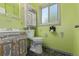 Charming bathroom with custom vanity and decorative accents at 9400 W Burgundy Ave, Littleton, CO 80123