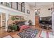 Comfortable living room with high ceilings and hardwood floors at 9400 W Burgundy Ave, Littleton, CO 80123