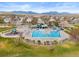 Aerial view showcases a community pool and recreation area with mountain views at 2545 Andrew Dr, Superior, CO 80027
