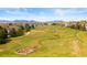 Scenic view of the open green space with walking paths, and distant mountains in the neighborhood at 2545 Andrew Dr, Superior, CO 80027