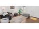 Cozy living room featuring wood floors, comfortable furniture, and a bright window at 2545 Andrew Dr, Superior, CO 80027
