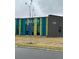 Community library with blue and green siding at 1353 Reynolds St # 5A, Fort Lupton, CO 80621