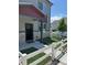 Inviting front entrance with tidy landscaping, modern design, and a welcoming walkway at 1353 Reynolds St # 5A, Fort Lupton, CO 80621