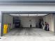 Spacious garage with ample storage space, perfect for parking and organizing belongings at 1353 Reynolds St # 5A, Fort Lupton, CO 80621