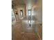 Carpeted staircase leading to upper level with neutral walls and natural light through the upper level windows at 1353 Reynolds St # 5A, Fort Lupton, CO 80621