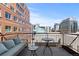 Balcony featuring outdoor seating area and city views at 1449 Wynkoop St # 601, Denver, CO 80202