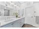 Modern bathroom with dual sinks, stylish lighting, and ample counter space at 1449 Wynkoop St # 601, Denver, CO 80202