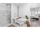 Luxurious bathroom showcasing a soaking tub, marble shower, and adjacent bedroom access at 1449 Wynkoop St # 601, Denver, CO 80202