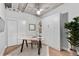 Modern bedroom with a murphy bed, built-in shelving, and ample natural light at 1449 Wynkoop St # 601, Denver, CO 80202