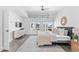 Modern bedroom with large windows offering city views and minimalist decor at 1449 Wynkoop St # 601, Denver, CO 80202