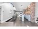 Spacious living space with skylights, bar, and exposed brick accents at 1449 Wynkoop St # 601, Denver, CO 80202