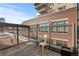 Enjoy the city view from this cozy balcony with table and chairs at 1449 Wynkoop St # 601, Denver, CO 80202