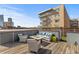Inviting outdoor rooftop seating area for enjoying the city skyline at 1449 Wynkoop St # 601, Denver, CO 80202