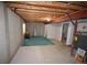 Unfinished basement space with exposed ceiling and concrete walls and floors at 2685 W Asbury Ave, Denver, CO 80219